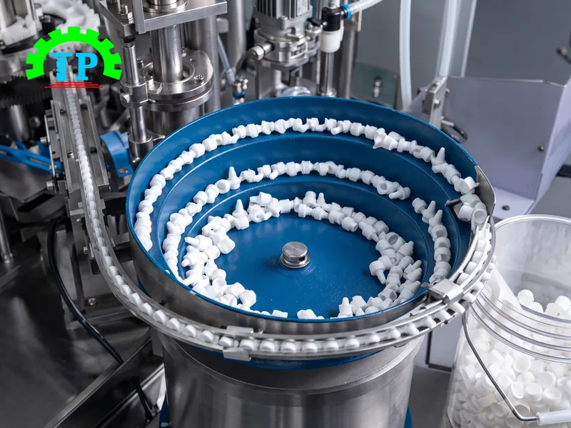 mâm xoay chiết rót và đặt nắp của máy đóng chai thuốc nhỏ mắt TPXC3-3000M